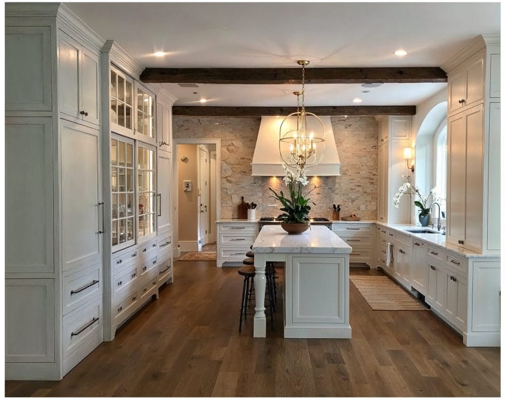 Stone accent wall giving character to the kitchen by Decorilla designer, Maria W.