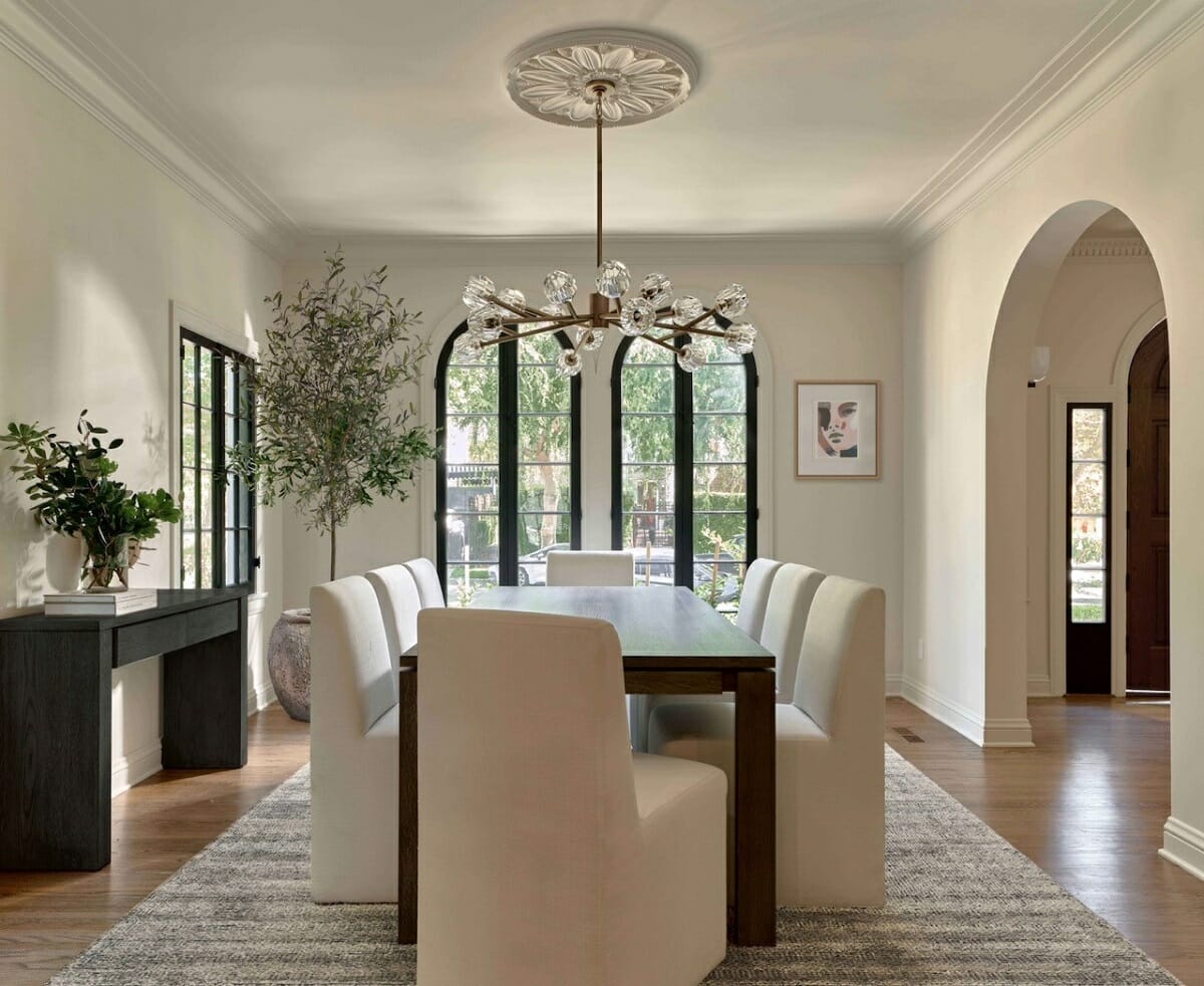 Stylish modern dining room ideas with white upholstered chairs by Britney W
