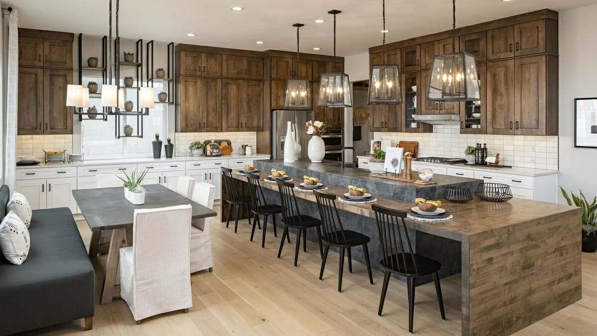 Traditional upholstered chairs in a New England style cottage kitchen interior design - Alexa H