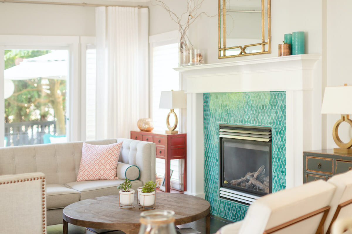 Furniture around a fireplace by Decorilla designer Jil M