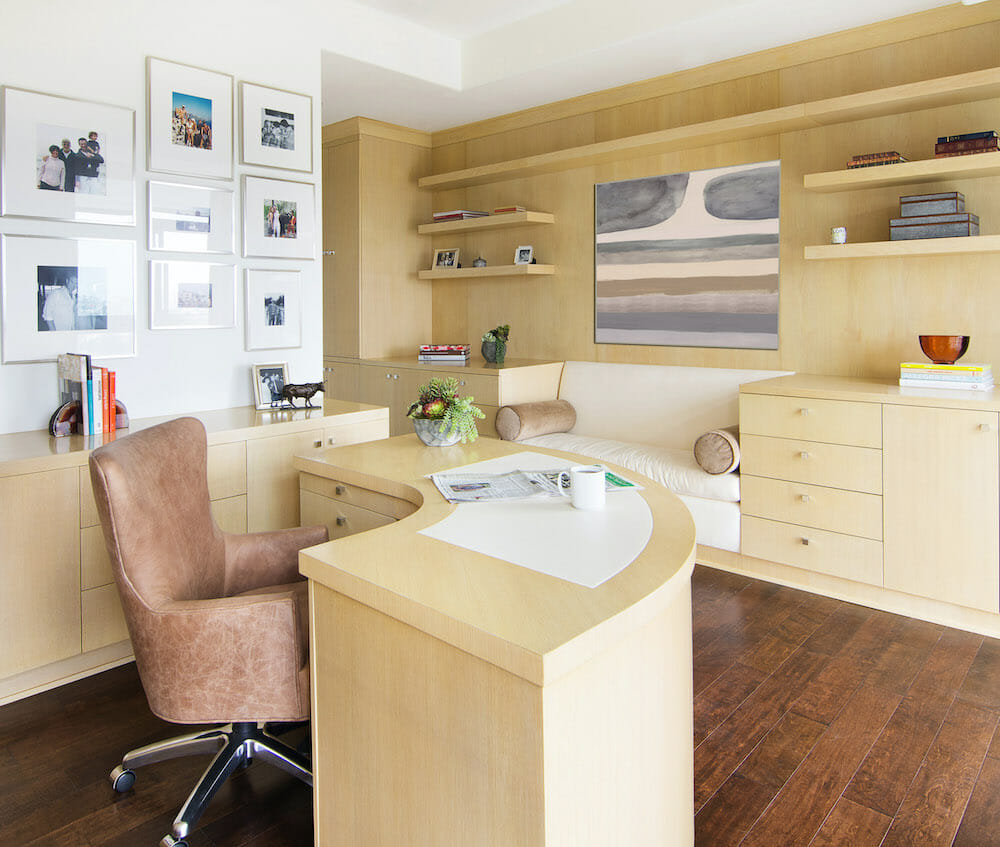 Contemporary office with curved writing desk by Decorilla designer, Lori D.