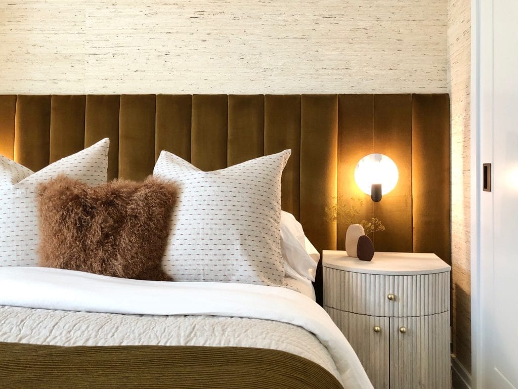 How to style curved furniture like in a bedroom by Decorilla designer, Chanelle M.
