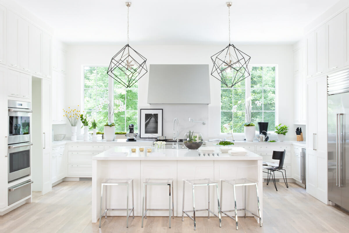 Lighting as decor for a kitchen island by Decorilla designer, Elizabeth L.