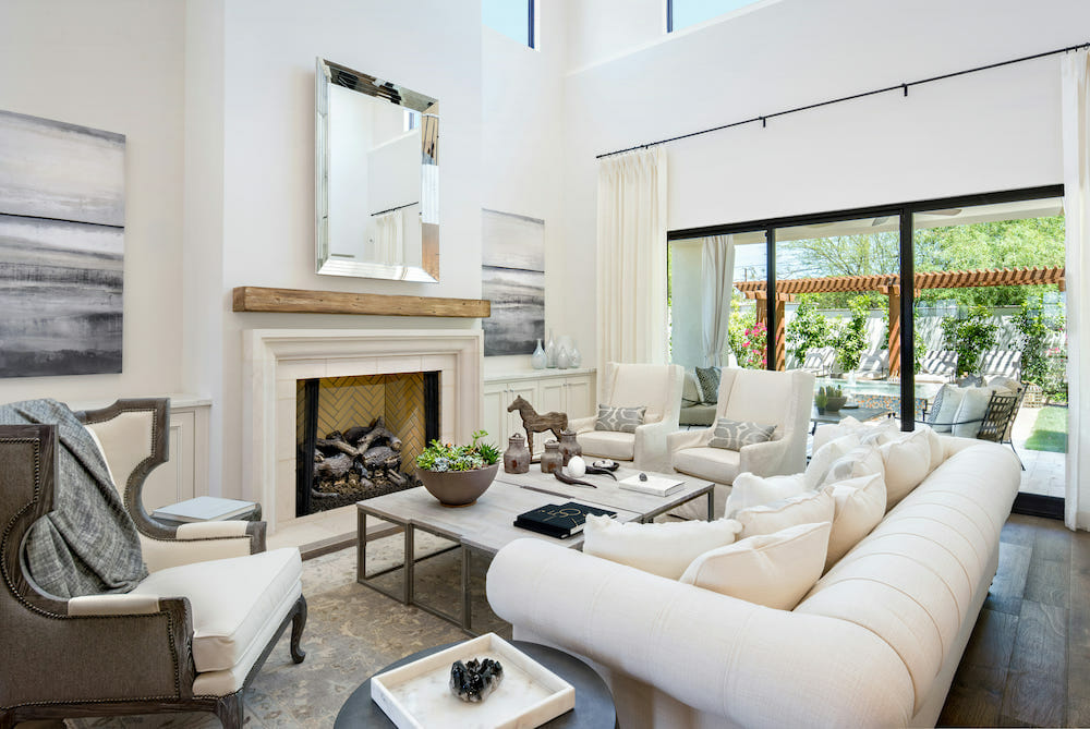 Living room layout around the fireplace by Decorilla designer, Mariko K.