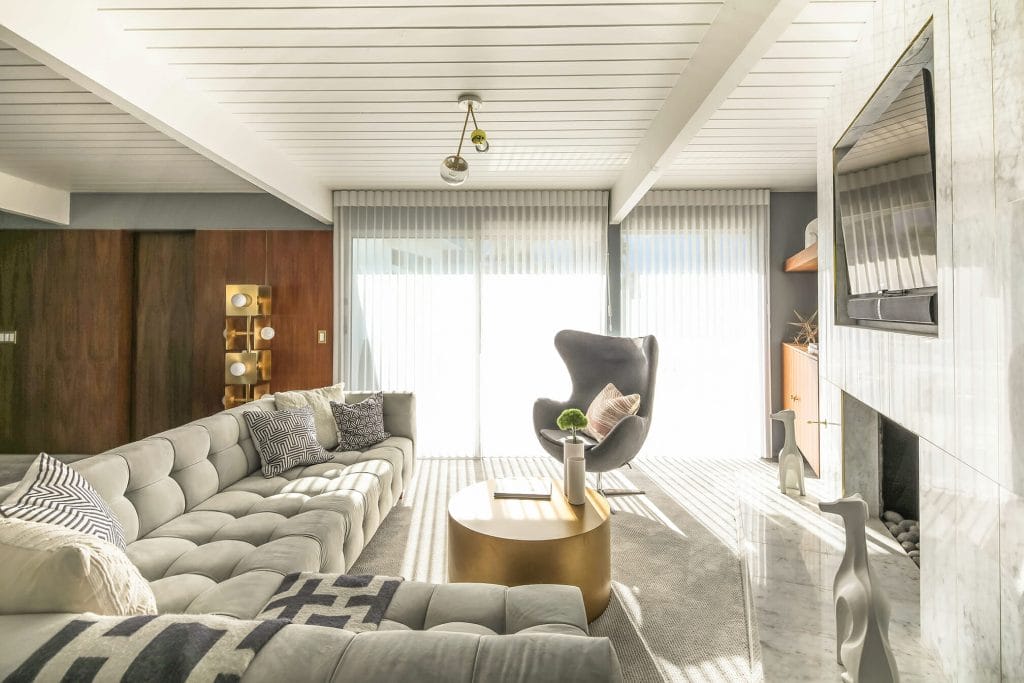 Living room layouts with a fireplace by Decorilla designer, Michelle B.