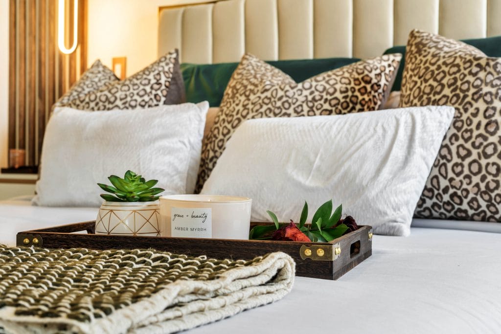 Dopamine decor in a bedroom by Decorilla designer, Aiesha M.