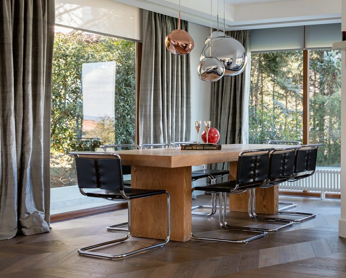 Mid century modern dining table in a roomy interior