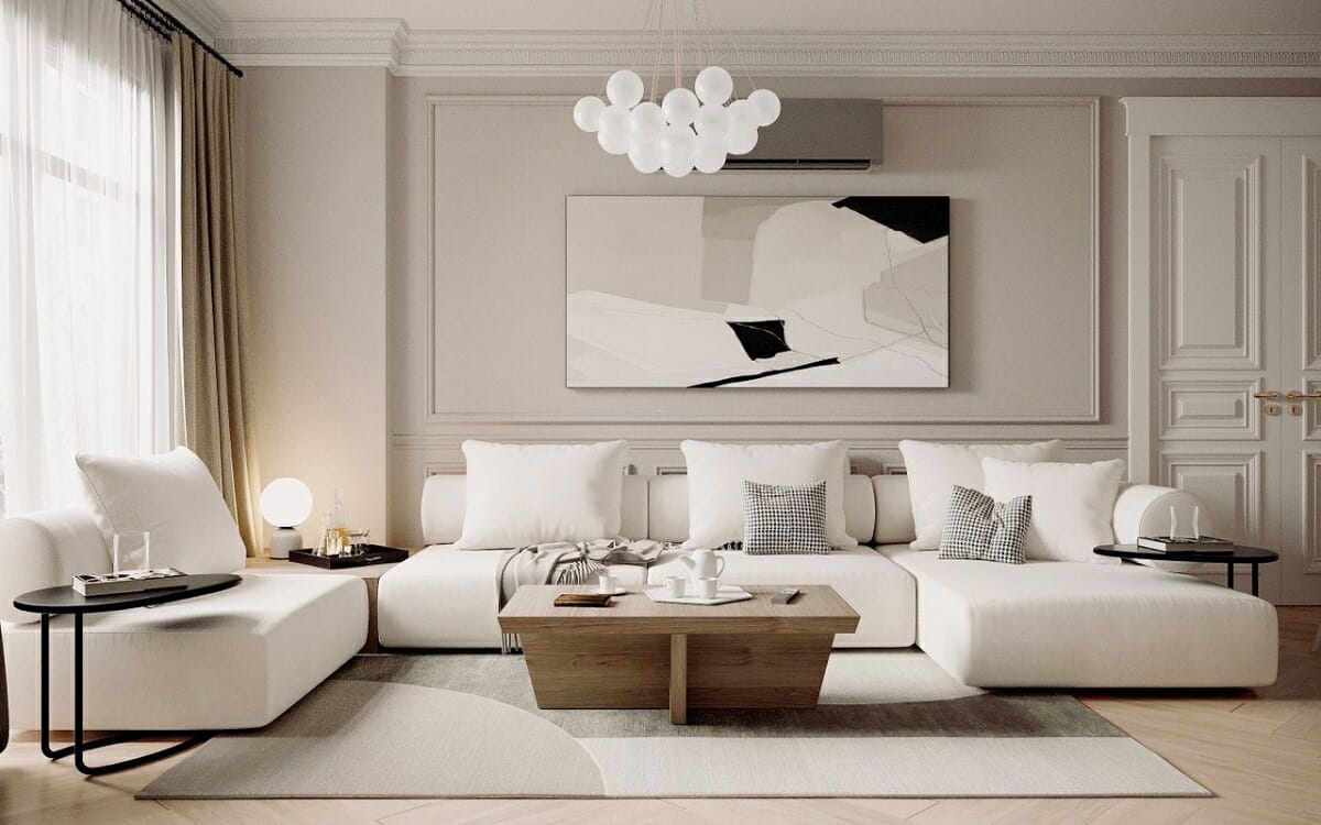 Modern living room with a sectional sofa in neutrals