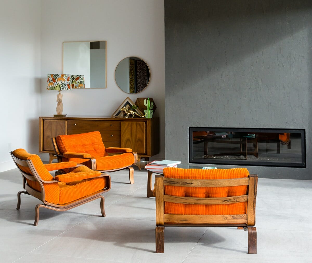 Modern minimalist living room with colorful armchairs