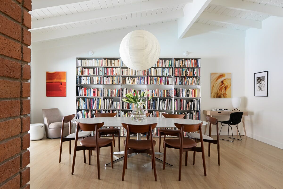 Multipurpose dining room design ideas with a home library