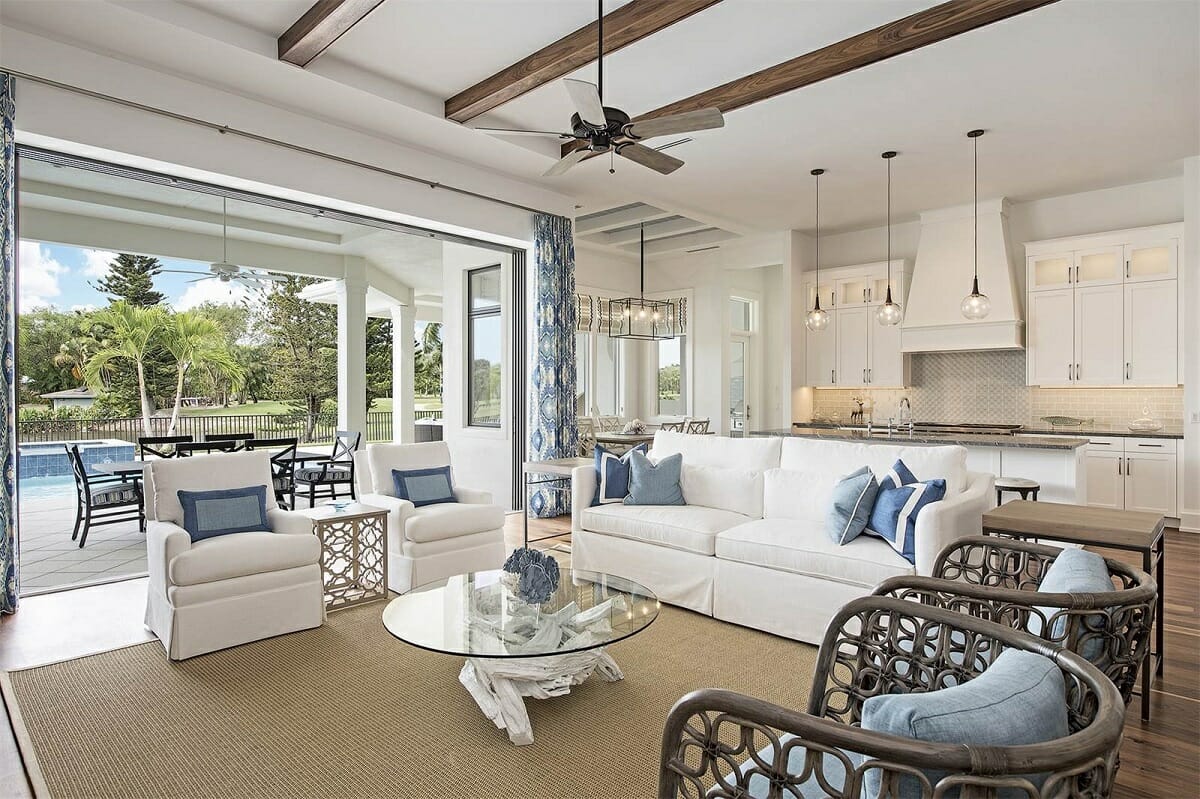 beach inspired living room and white kitchen