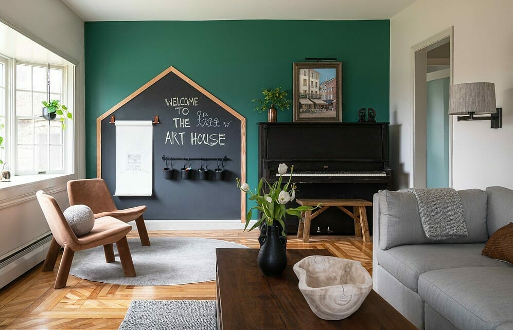 Awkward apartment living room layout with a rectangular plan and accent wall to make it feel more in proportion