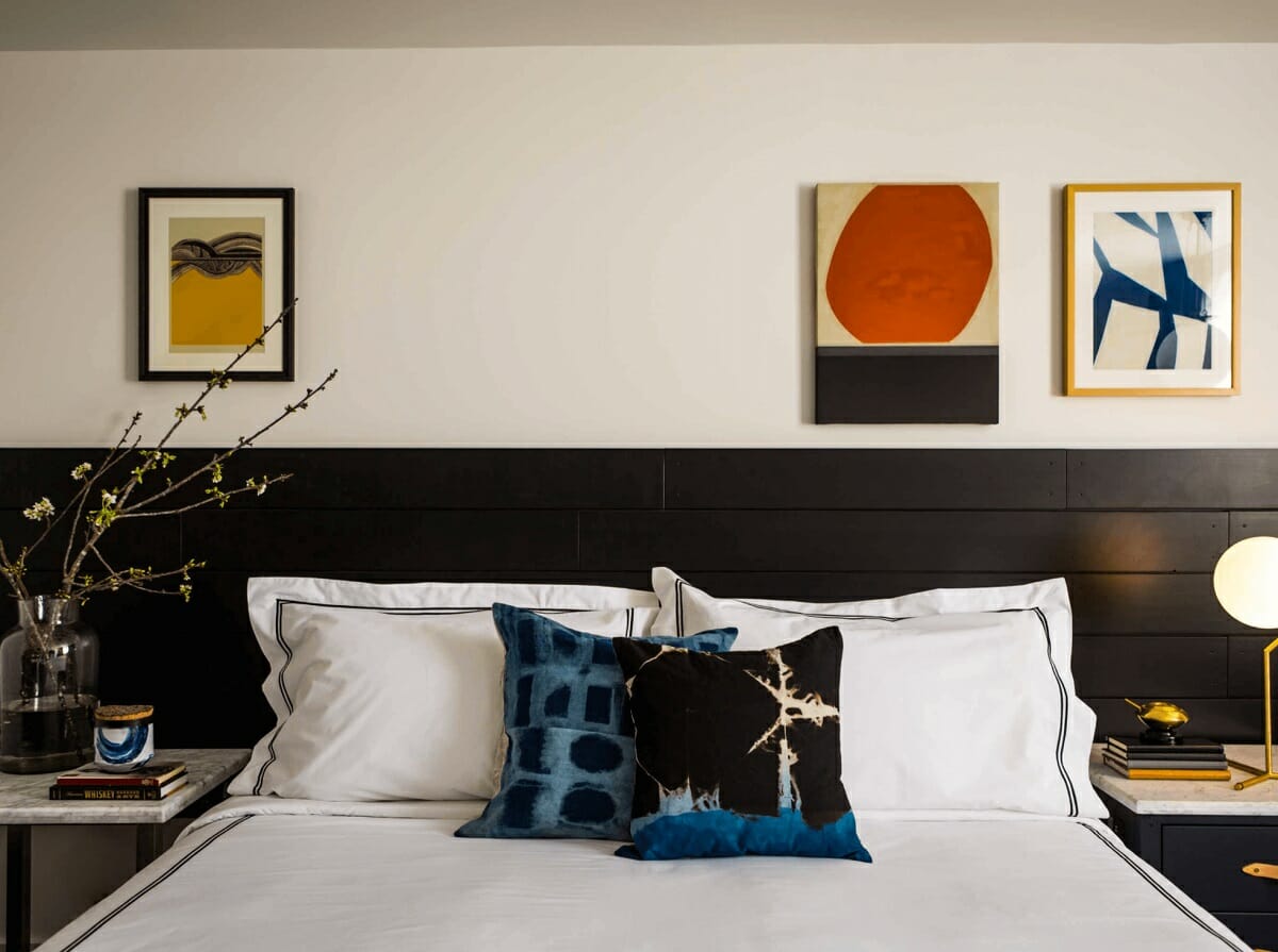 Decorating pictures on a bedroom wall with a headboard