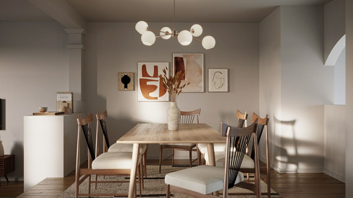 Dining room gallery wall in warm tones in a japandi interior design