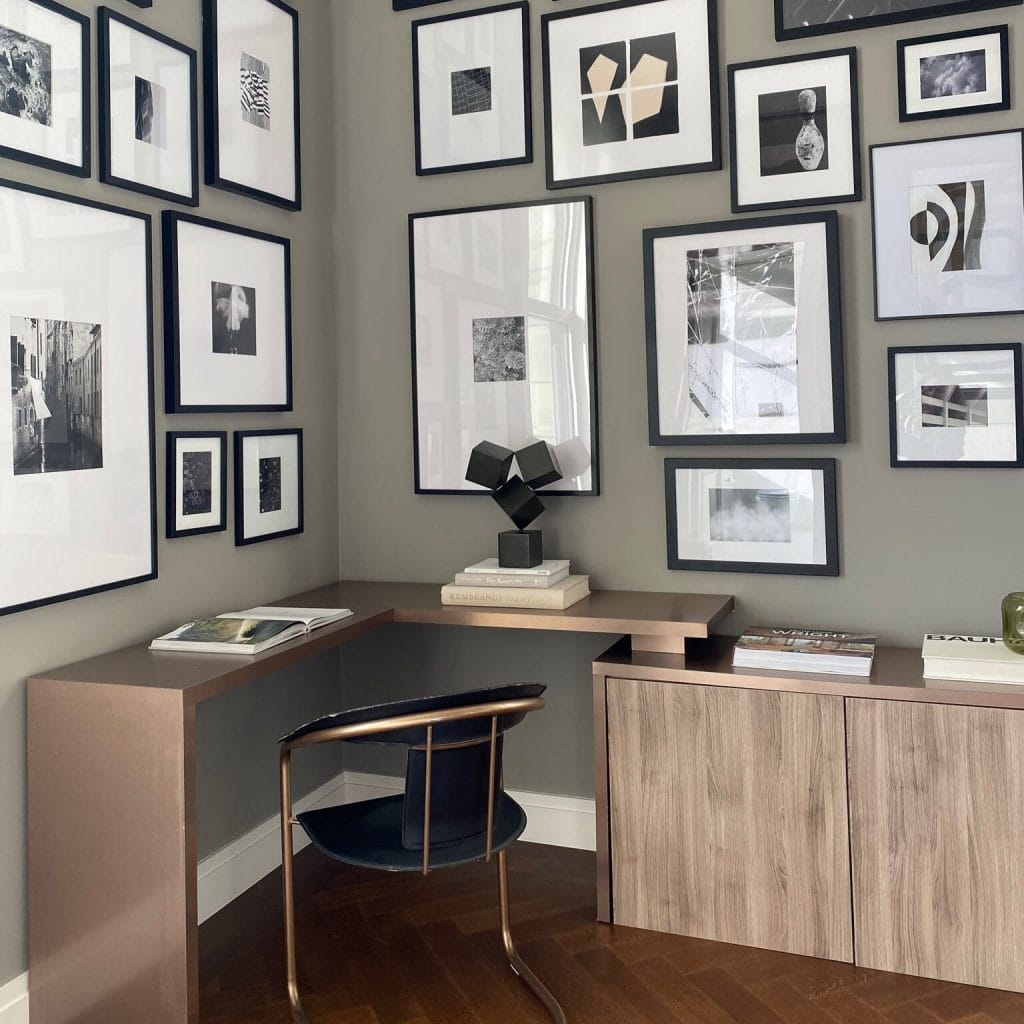 Dynamic gallery wall ideas in a home office by Decorilla designer, Chanelle M.