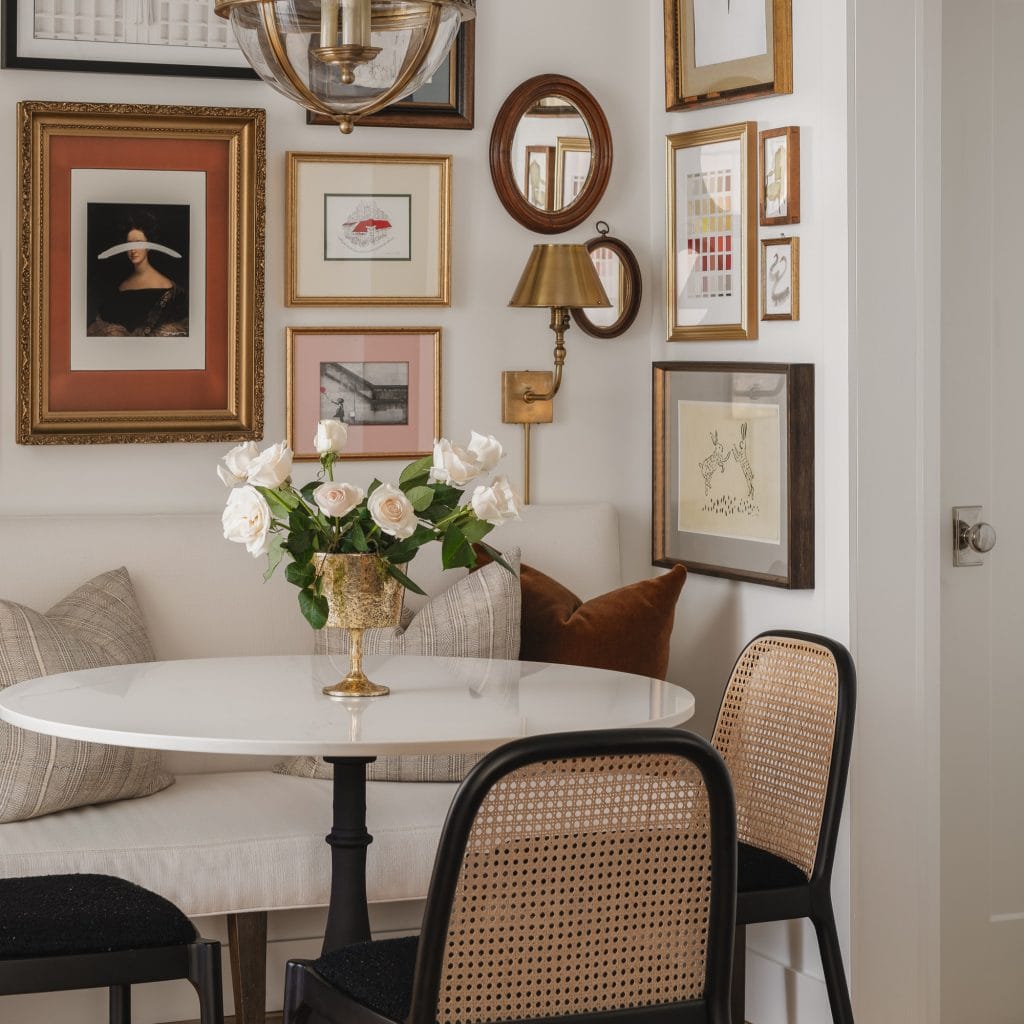 Gallery wall ideas in a dining room by Decorilla designer, Christina M.