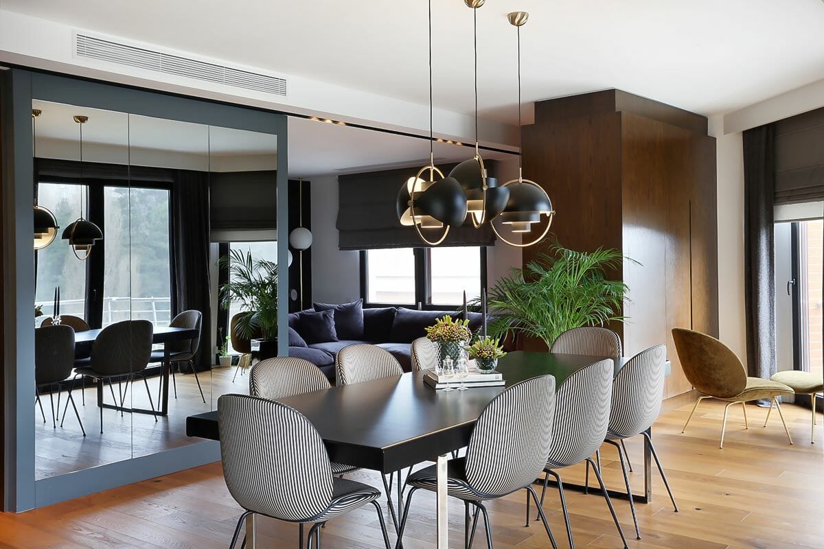 Sculptural dining room lighting trends by Decorilla designer Meric S.