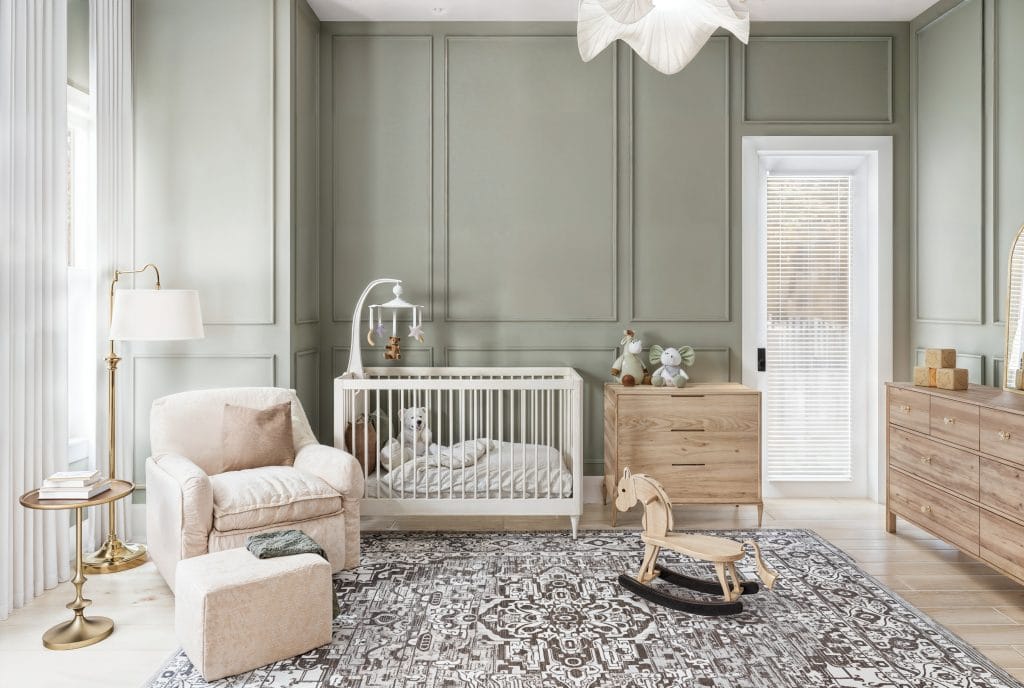 Sage green gender-neutral nursery interior design by Decorilla designer, Lara D.
