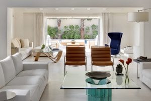 Upscale, curated living room furnished in some of the best NYC furniture stores, by Decorilla designer, Catherine W.