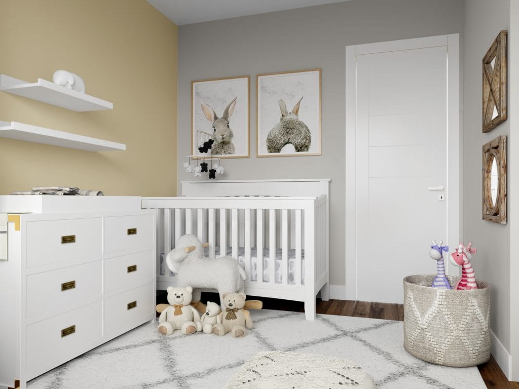 Yellow accent wall in a gender-neutral nursery by Decorilla designer, Lauren A.