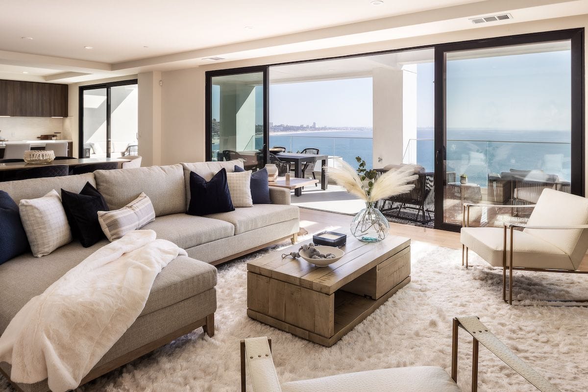 Soft-white-and-grey-living-room-rug in an interior with a view