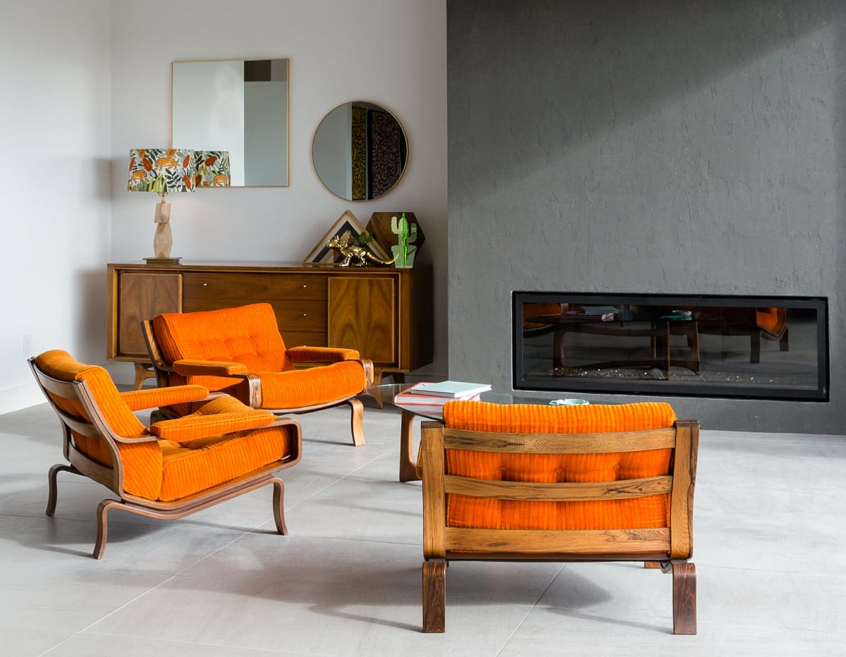 Famous chair designs - famous mid century designer chairs in a lounge