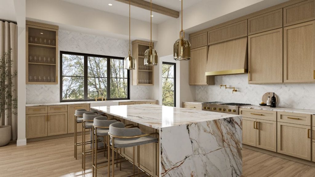 Kitchen countertop ideas with prominent veining and waterfall edge, design by Decorilla