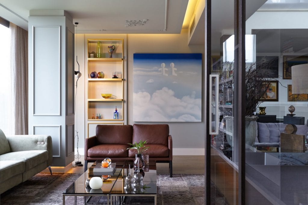 Modern versatile apartment living room by Decorilla designer, Meric S.