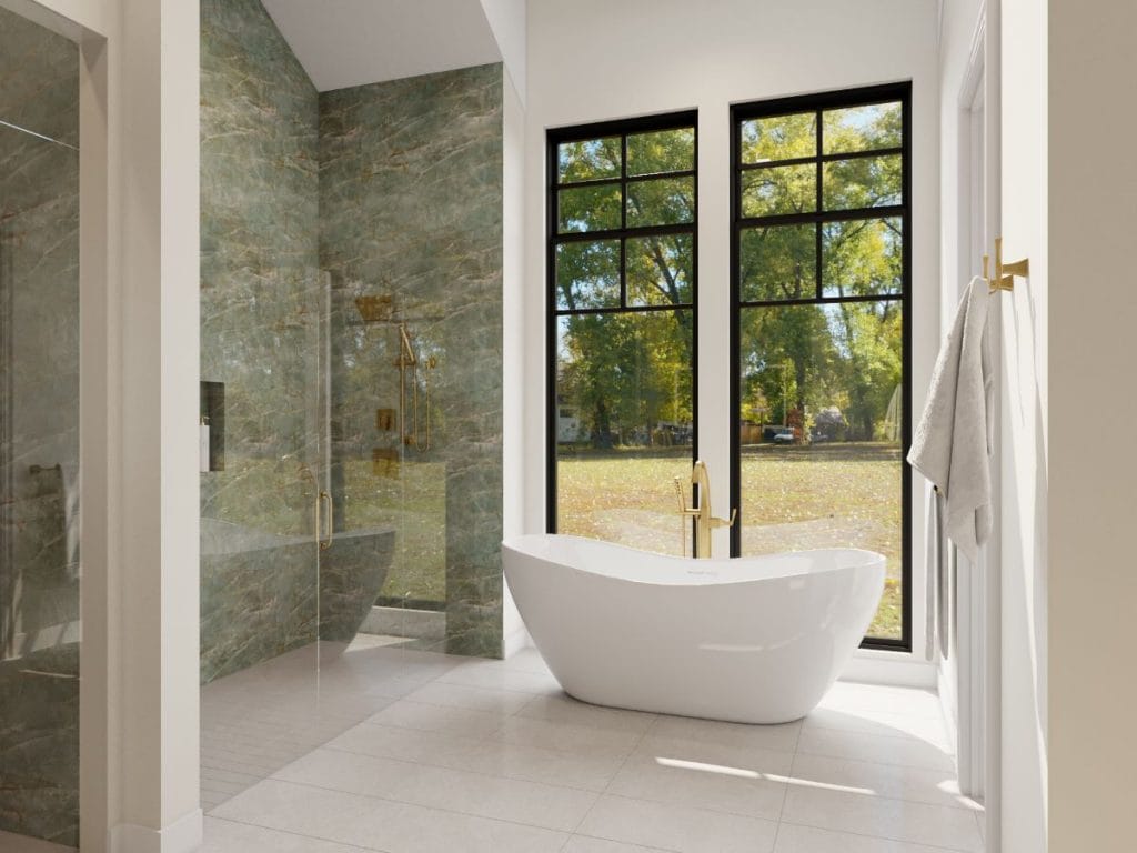 Japanese garden style bathtub in a bathroom by Decorilla