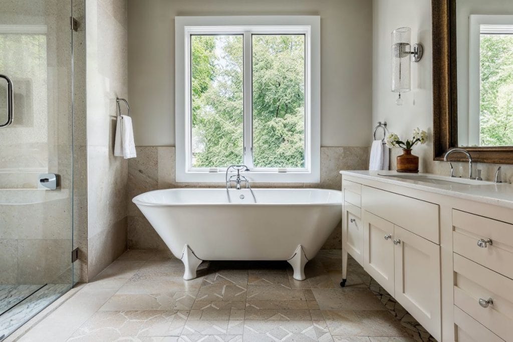Modern clawfoot tub in a bathroom by Decorilla
