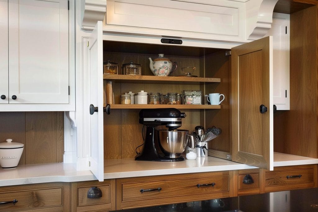 Baking appliance garage in a farmhouse kitchen by Decorilla