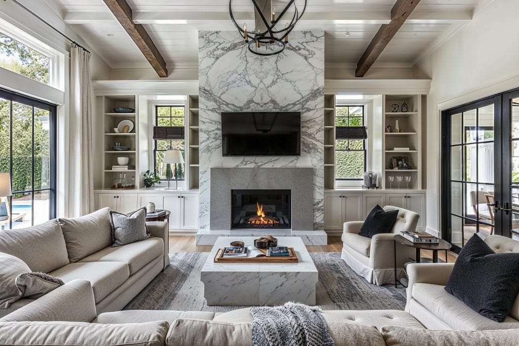 Breezy white plank ceiling elegance of a living room by Decorilla