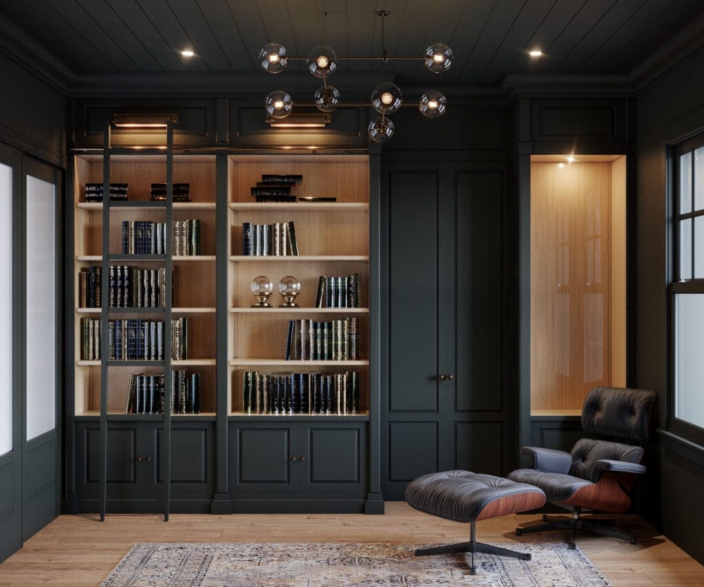 Built-in library in a dark green home office by Decorilla