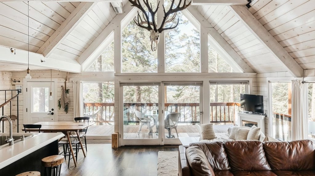 Cathedral ceiling design in an A-frame cabin by Decorilla