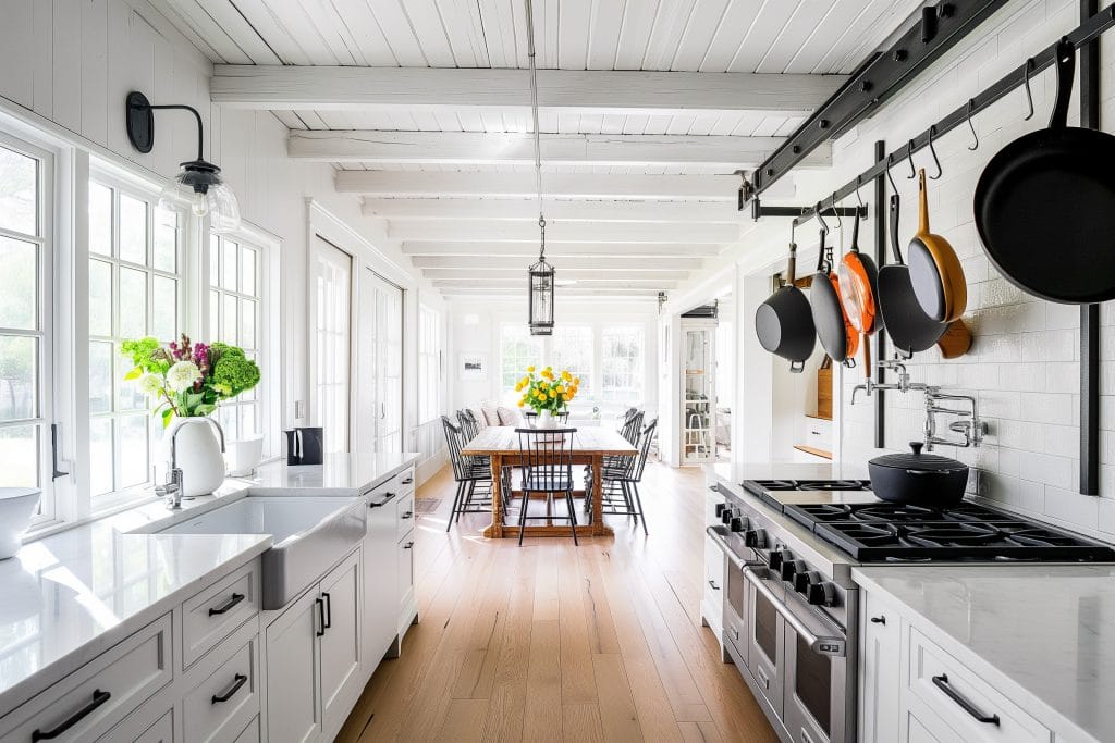 Farmhouse galley kitchen design by Decorilla