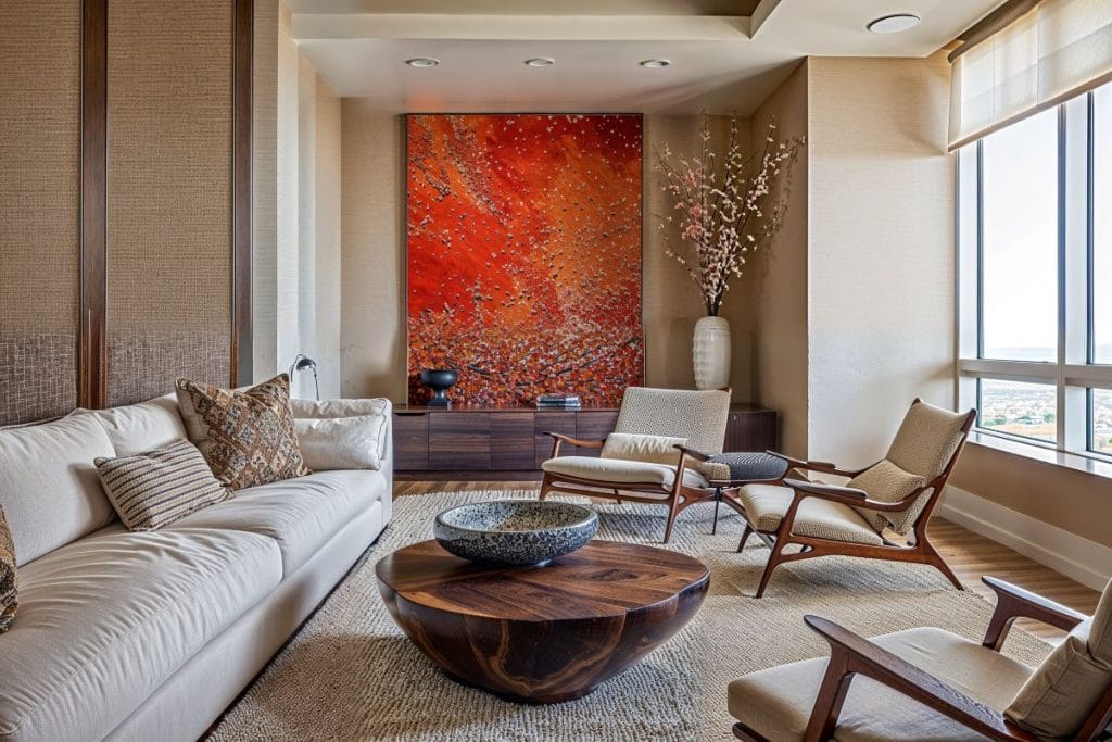 Living room exemplifying quiet luxury with Asian decor accents, by Decorilla