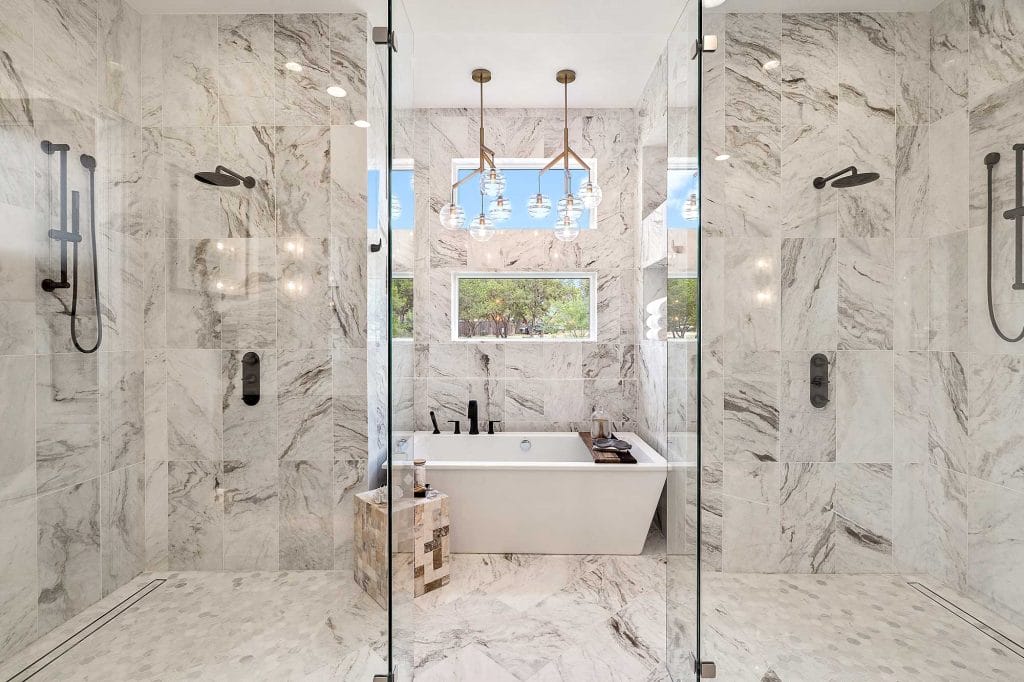 Open-concept bathroom design boasting a spa experience by Decorilla