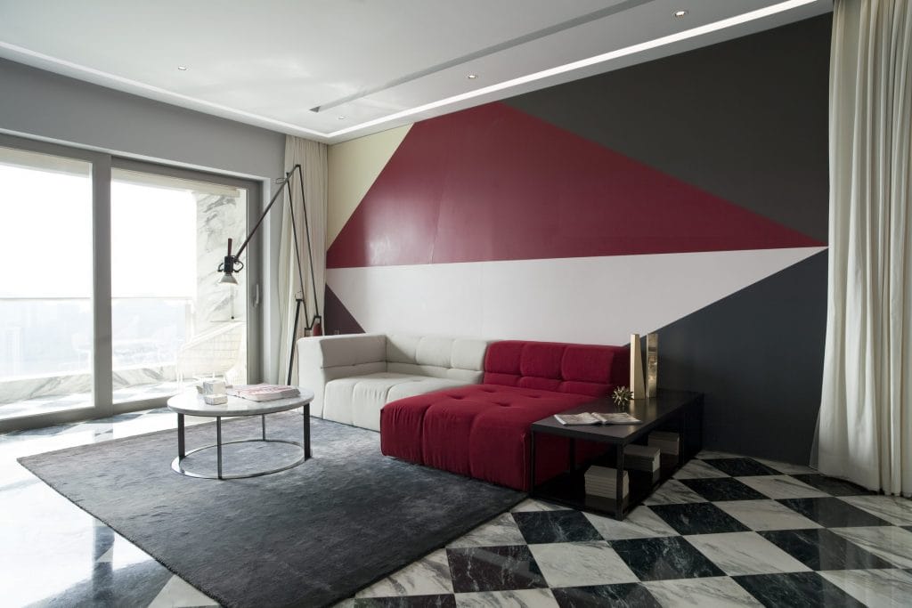 Black and white color block scheme in a room by Decorilla