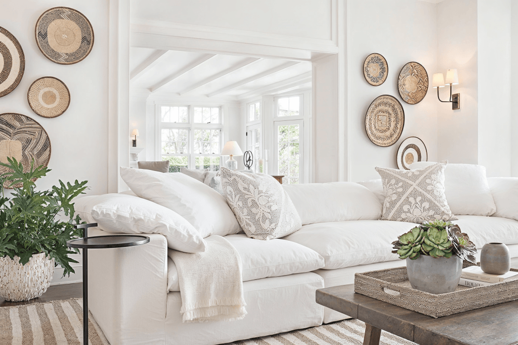 Handmade decor giving character to a white boho rustic interior by Decorilla designer, Peter C.