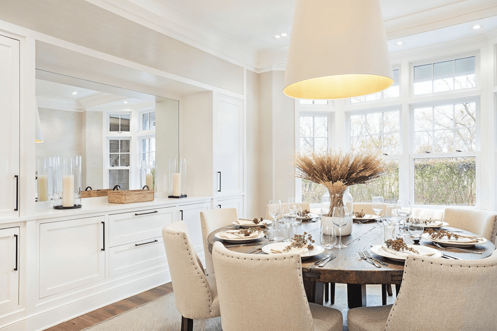 Rustic dining table and minimal modern farmhouse decor in an interior by Decorilla designer, Peter C.
