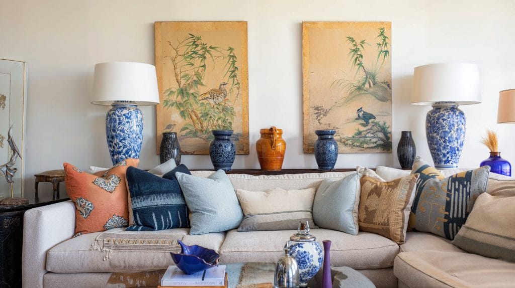 Vases, pottery, and other varieties of art in a room design by Decorilla
