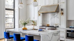 Transitional kitchen with custom kitchen hood by DECORILLA
