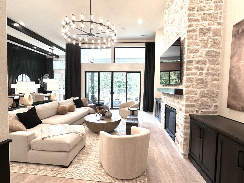 Muted tones and organic materials in a serene modern cottage house interior by Decorilla