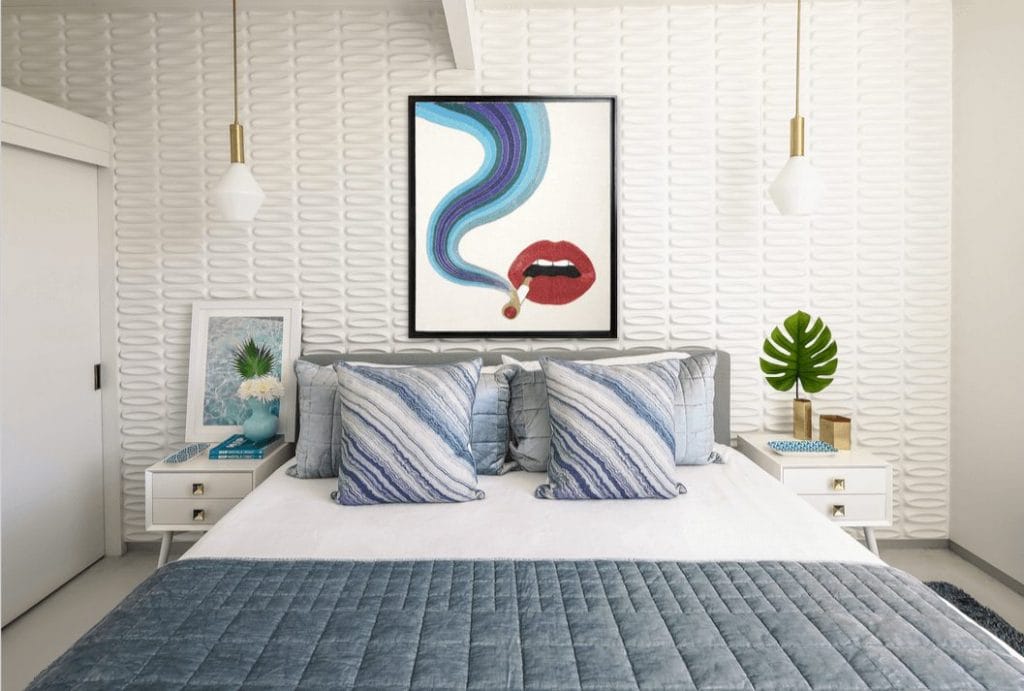 Contemporary bedroom with textured wall design by DECORILLA designer, Michelle B.