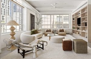 Contemporary living room decor around a TV by Decorilla designer, Leanna S