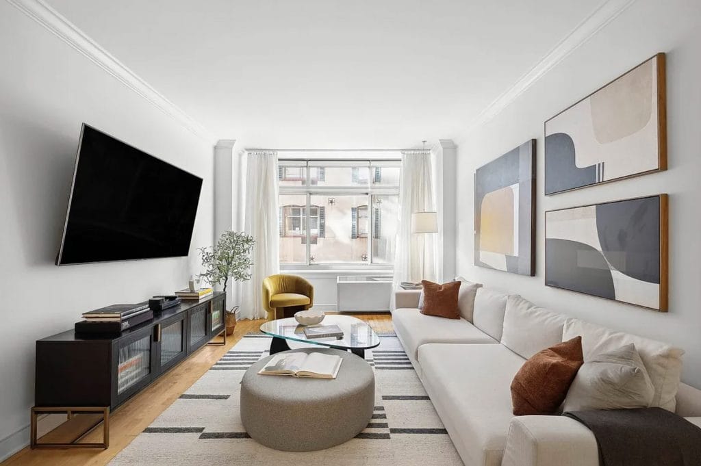 living room decor around a TV by Decorilla designer, Leanna S. 