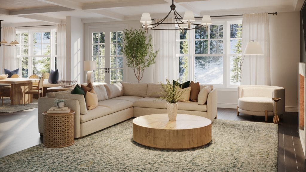 A family-friendly living room featuring a plush sectional and vibrant accents by Decorilla​