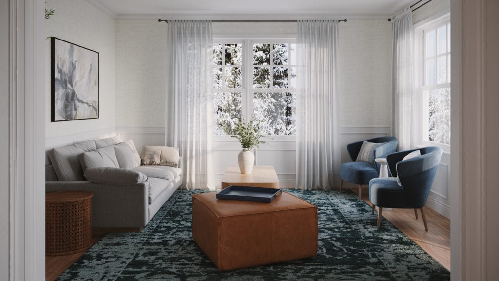 Thoughtfully chosen family-friendly furniture enhances this conversation area by Decorilla​