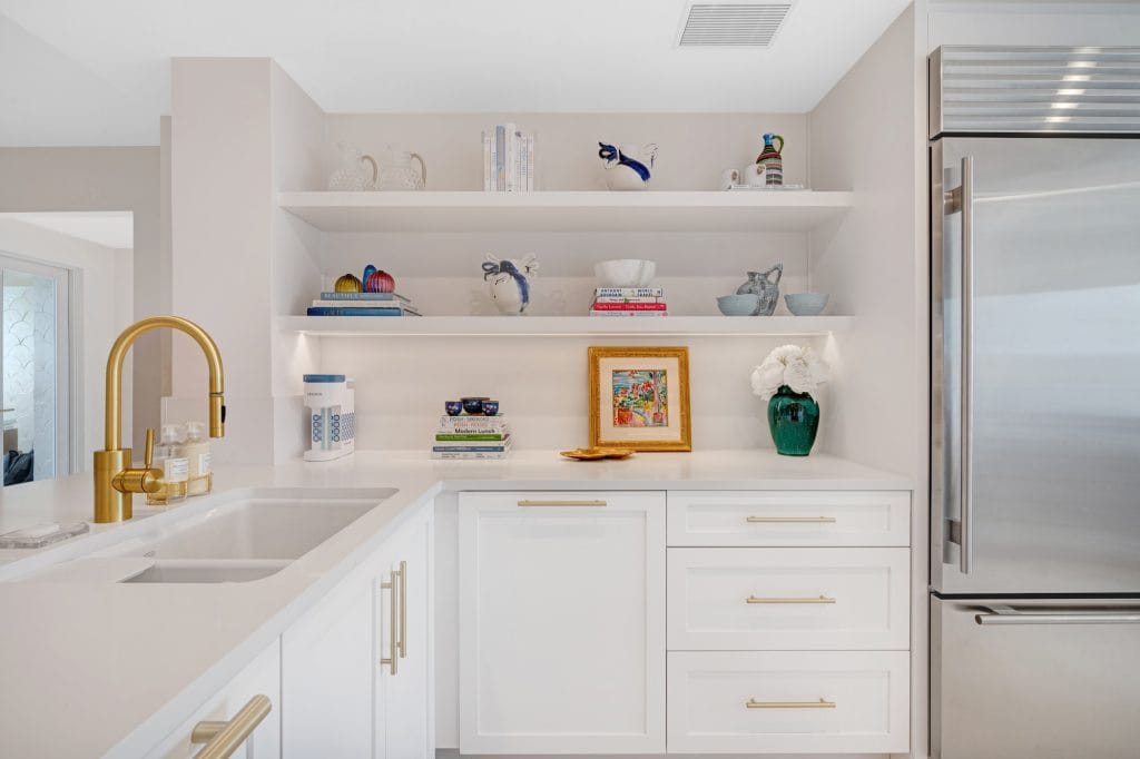 Bookshelf wealth in a kitchen by Decorilla designer, Michael J. 