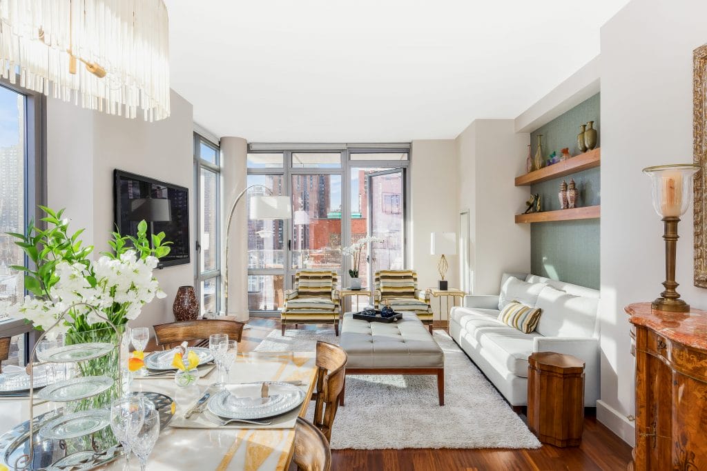 Chrome accent plates in a living-dining room by Decorilla designer, Joyce T.